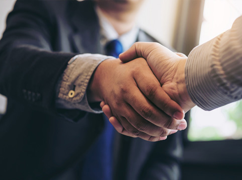 two men shaking hands